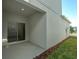 Covered patio with sliding glass doors leading to the interior at 434 Belmond Dr, Debary, FL 32713