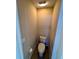 Small bathroom with toilet and tile floor at 10065 Lake District Ln, Orlando, FL 32832
