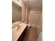 Bathroom with tub, toilet and vanity at 10065 Lake District Ln, Orlando, FL 32832