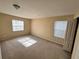 Bright bedroom with window and closet at 10065 Lake District Ln, Orlando, FL 32832