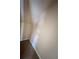 Small closet with beige walls and tile floor at 10065 Lake District Ln, Orlando, FL 32832