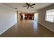 Open living space with tile floors and ceiling fan at 10065 Lake District Ln, Orlando, FL 32832