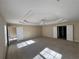 Large main bedroom with carpet and ensuite access at 10065 Lake District Ln, Orlando, FL 32832