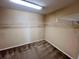 Large walk-in closet with wire shelving at 10065 Lake District Ln, Orlando, FL 32832