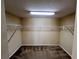 Spacious walk-in closet with double hanging rods at 10065 Lake District Ln, Orlando, FL 32832
