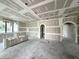 Open concept living area, under construction with drywall and electrical at 1751 Glencoe Rd, Winter Park, FL 32789