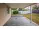 Covered patio overlooking a fenced backyard at 4533 San Sebastian Cir, Orlando, FL 32808