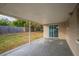 Covered patio with access to the backyard at 4533 San Sebastian Cir, Orlando, FL 32808
