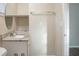 Bathroom with granite vanity and linen storage at 4533 San Sebastian Cir, Orlando, FL 32808