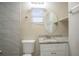 Clean bathroom with granite vanity and tiled shower/tub at 4533 San Sebastian Cir, Orlando, FL 32808