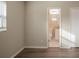 Bedroom with wood-look floors and bathroom access at 4533 San Sebastian Cir, Orlando, FL 32808