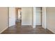 Spacious bedroom with wood-look floors and double closets at 4533 San Sebastian Cir, Orlando, FL 32808