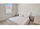 Cozy bedroom with neutral tones, natural light, and classic decor for a relaxing atmosphere at 7889 Penrose Pl, Wildwood, FL 34785