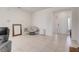 Spacious living area with tiled floors, comfortable seating, and a bright, airy atmosphere at 7889 Penrose Pl, Wildwood, FL 34785