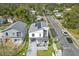 Overhead view of modern homes with paved driveways and manicured lawns in a suburban neighborhood at 801 W Anderson St, Orlando, FL 32805