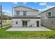 Modern home backyard with a paved patio and sliding glass doors at 801 W Anderson St, Orlando, FL 32805