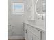 Modern bathroom with a white marble wall, dual mirrors, and modern fixtures at 801 W Anderson St, Orlando, FL 32805