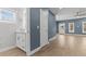 Modern bathroom with a white vanity, marble wall, and a window at 801 W Anderson St, Orlando, FL 32805