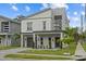 Beautifully designed two-story home with modern architectural details and landscaped front yard at 801 W Anderson St, Orlando, FL 32805