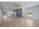 Spacious living room with hardwood floors, recessed lighting, and a ceiling fan at 801 W Anderson St, Orlando, FL 32805