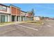 Townhome exterior featuring modern architecture, neat landscaping, and ample parking space at 3245 Sustainable Way, Kissimmee, FL 34747
