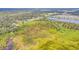 Expansive aerial view of land surrounded by trees with potential for development and serene natural beauty at 4750 Rummell Rd, Saint Cloud, FL 34771