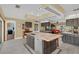 Bright kitchen with granite countertops, stainless appliances and views to the breakfast room at 4750 Rummell Rd, St Cloud, FL 34771