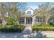 Charming two-story home with manicured lawn and inviting front porch in a tranquil neighborhood at 8677 Pinter St, Orlando, FL 32827