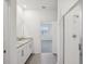 Modern bathroom with double vanity and a glass shower at 2149 Rosewood Dr, Bartow, FL 33830
