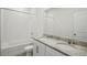 Bathroom featuring double vanity, granite countertop and a tub at 2149 Rosewood Dr, Bartow, FL 33830
