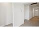 Bright hallway with tile flooring and access to rooms at 2149 Rosewood Dr, Bartow, FL 33830