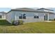 Rear view of house showcasing sliding glass door at 2149 Rosewood Dr, Bartow, FL 33830