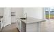 Kitchen island with granite countertop and stainless steel sink at 2149 Rosewood Dr, Bartow, FL 33830