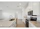 Bright kitchen with stainless steel appliances and granite countertops at 2149 Rosewood Dr, Bartow, FL 33830