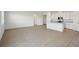 Open concept kitchen with an island and wood-look tile floors at 2149 Rosewood Dr, Bartow, FL 33830
