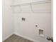 Laundry room with shelving and hookups for washer and dryer at 2149 Rosewood Dr, Bartow, FL 33830