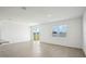 Bright and airy living room with tile flooring and access to backyard at 2149 Rosewood Dr, Bartow, FL 33830