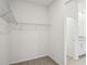 Large walk-in closet with wire shelving for storage at 2149 Rosewood Dr, Bartow, FL 33830
