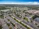 Aerial shot of residential community with townhouses, landscaping, and proximity to retail at 3529 Sanctuary Dr, St Cloud, FL 34769