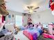 Cheerful bedroom with a fun, colorful theme and a cozy, inviting atmosphere at 3529 Sanctuary Dr, St Cloud, FL 34769