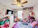 bedroom filled with plush toys, ceiling fan, and plenty of natural light at 3529 Sanctuary Dr, St Cloud, FL 34769