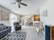 Open-concept floor plan with the living room flowing into the dining and kitchen area at 3529 Sanctuary Dr, St Cloud, FL 34769