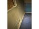 Distressed room featuring peeling wallpaper, damaged flooring, and evidence of water damage at 1805 W 15Th St # 1/2, Sanford, FL 32771