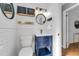 Chic bathroom with blue vanity, stylish lighting, and tiled walls at 2201 Delaney. Ave, Orlando, FL 32806