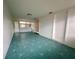 Bright sunroom with geometric floor tiles and white brick walls and plenty of natural light at 2201 Delaney Ave, Orlando, FL 32806