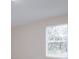 Bright bedroom has neutral walls and large window offering views of the surroundings at 6893 Hidden Glade Pl, Sanford, FL 32771