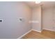 Practical laundry area with wood floors and utility connections for appliances at 6893 Hidden Glade Pl, Sanford, FL 32771