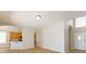 Open concept living space with hardwood floors and a view of kitchen at 6893 Hidden Glade Pl, Sanford, FL 32771