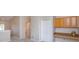 Upper level landing with built-in desk area, providing functional space and storage solutions at 6893 Hidden Glade Pl, Sanford, FL 32771