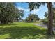 A verdant and level building lot with lush green grass is ready for construction at 1669 Markel Dr, Winter Garden, FL 34787